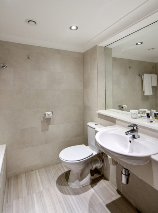 A bathroom in a classic bedroom at mercure manchester piccadilly hotel