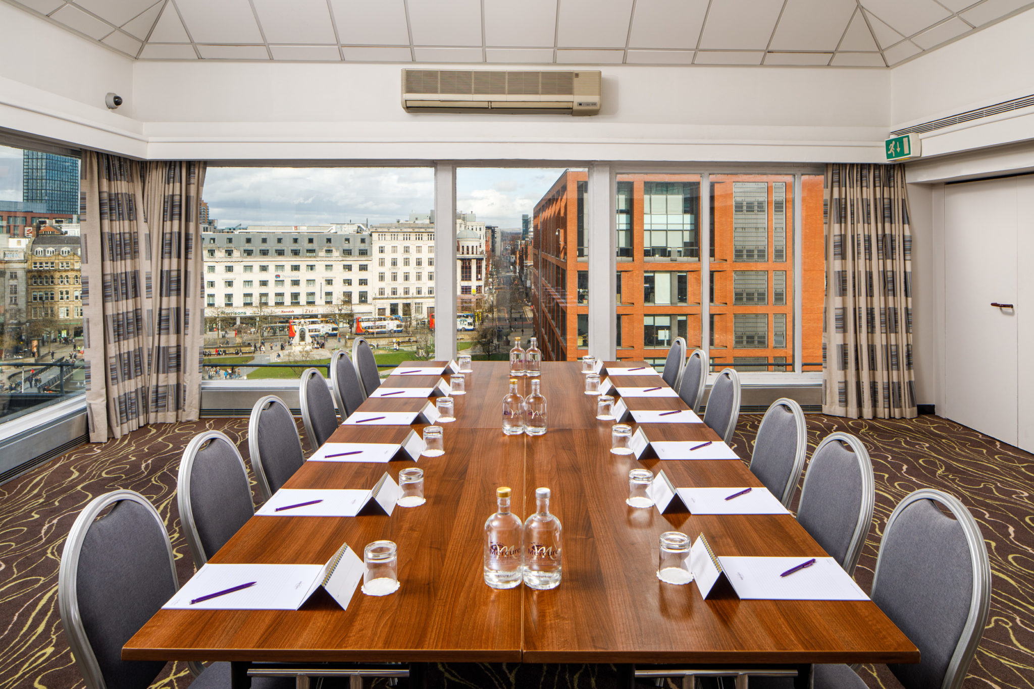 Mercure-Manchester-Piccadilly-Hotel-Hyde-Park-Meeting-Room-07-lr-080320 Tables and chairs set for a meeting or conference in The Ambassador Room at mercure gloucester bowden hall hotel