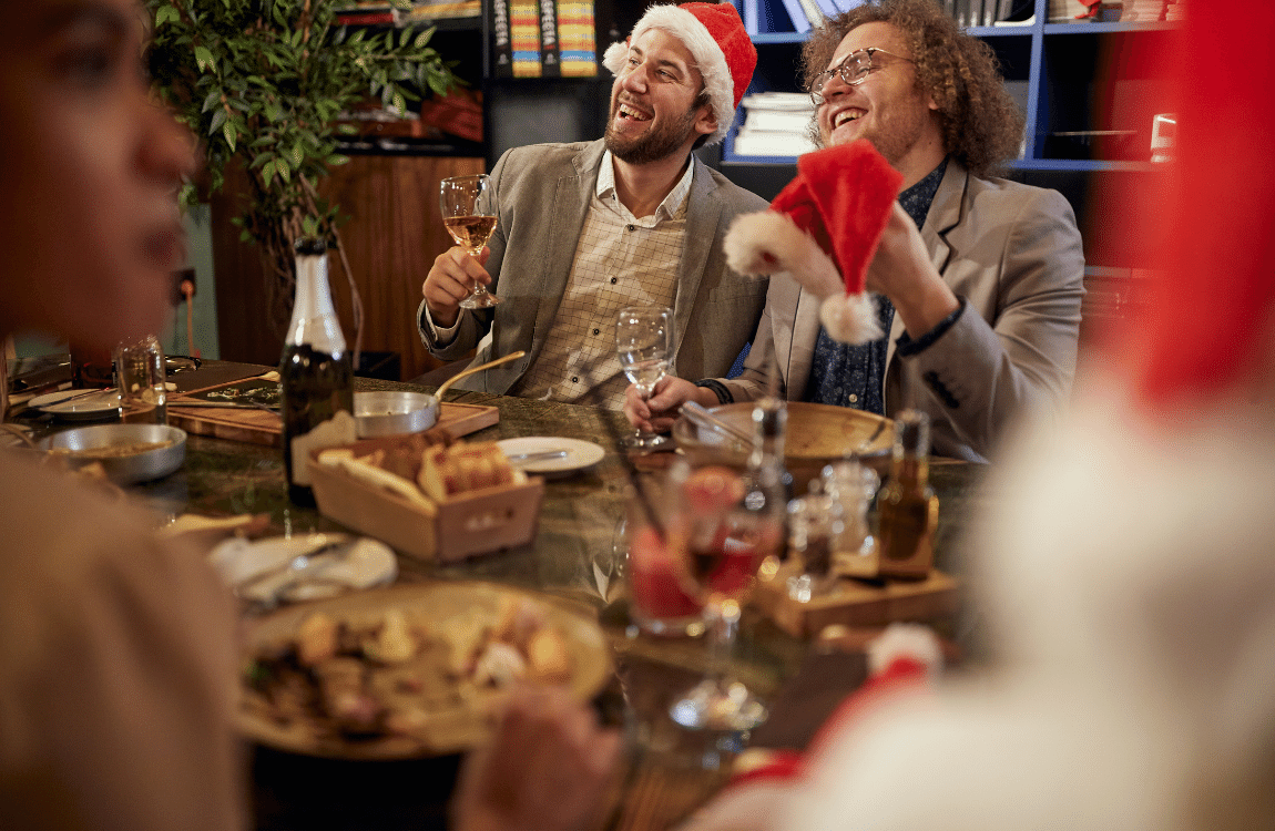 family sitting round or meal at restaurant