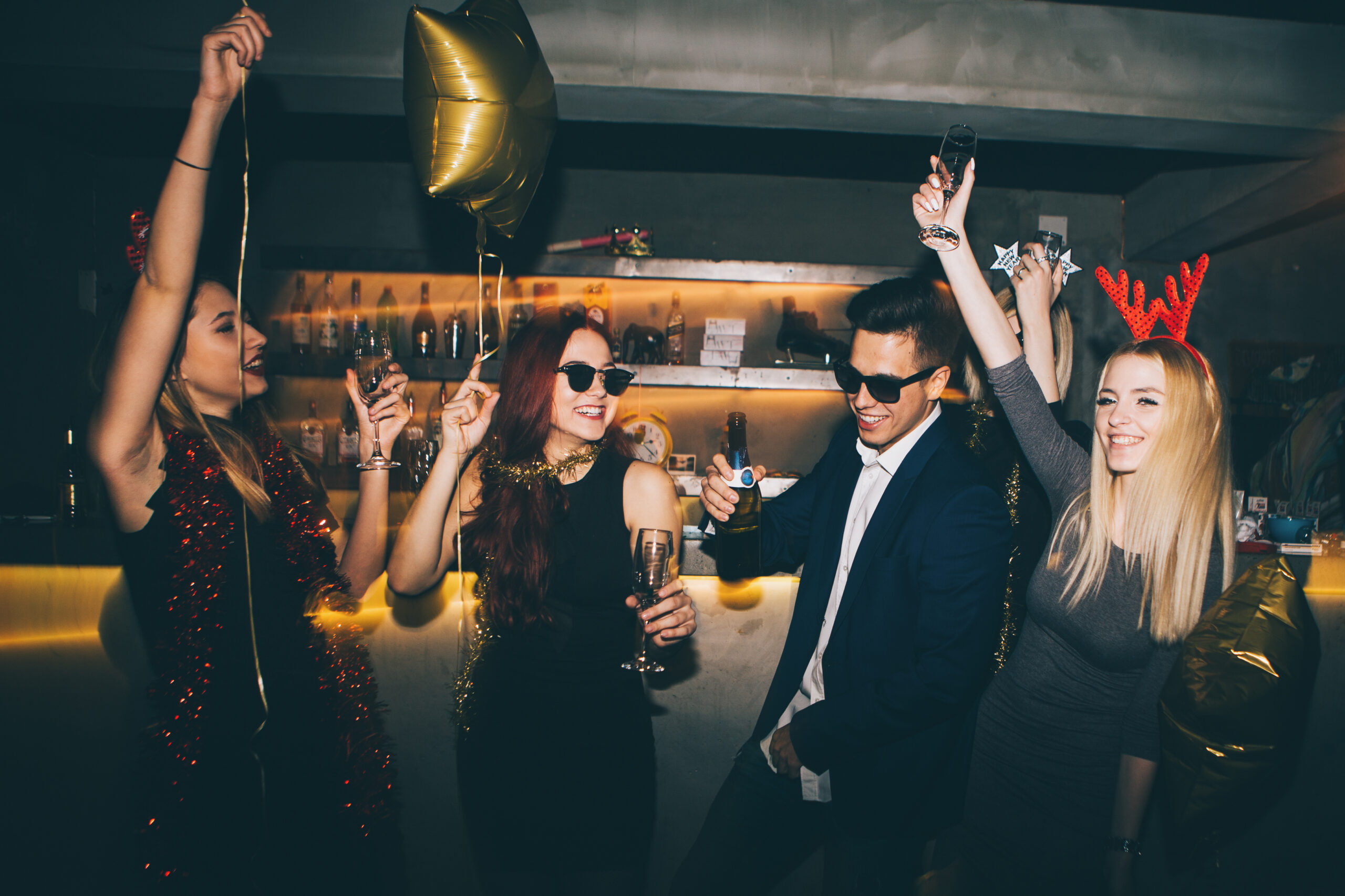 Group,Of,Friends,At,Club,Having,Fun