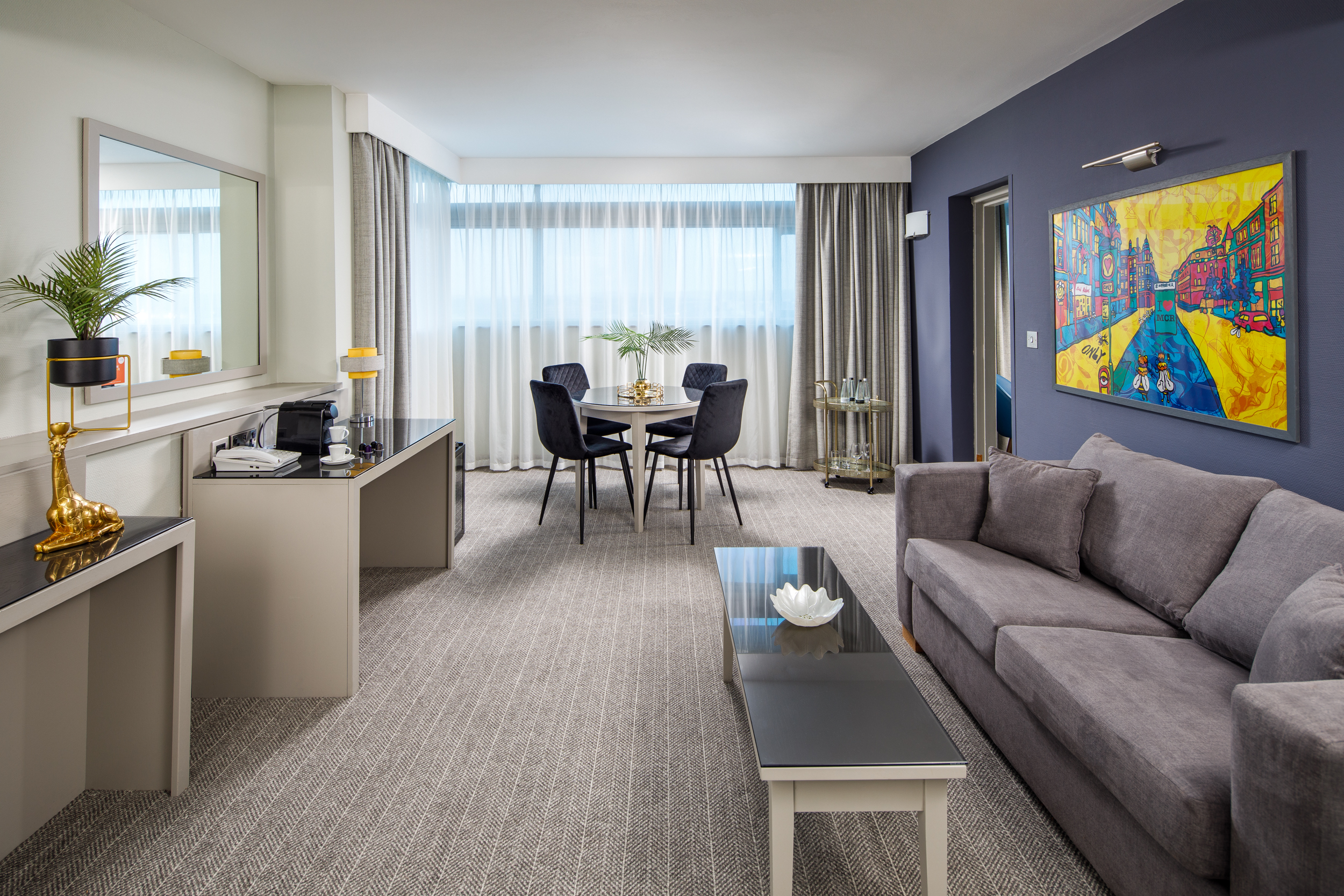 Superior Room Lounge 1 Low Res Meeting room table laptop and notepad at mercure hotels